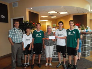 Members of the Quinte West Wolverines with Cheryl Lepine and Dr. Steen