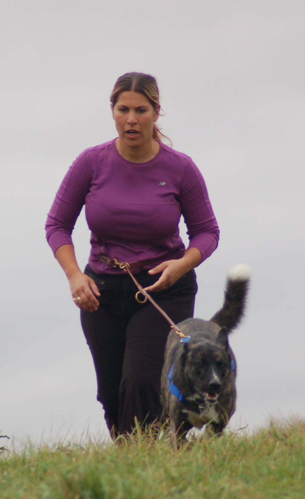 Lisa Marie walking Mowgli the dog